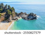 McWay Falls on Highway 1 and Big Sur along the Pacific Ocean coast, beautiful landscape and aerial view, sunset, sunrise, fog. Concept, travel, vacation, weekend.