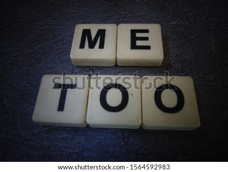 Me Too, word cube with background.