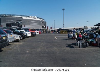 Meadowlands, New Jersey - Circa 2017: New York Jets Fans Tailgate In The Parking Lot Outside Metlife Stadium Before American Football Game During A Sunny Day