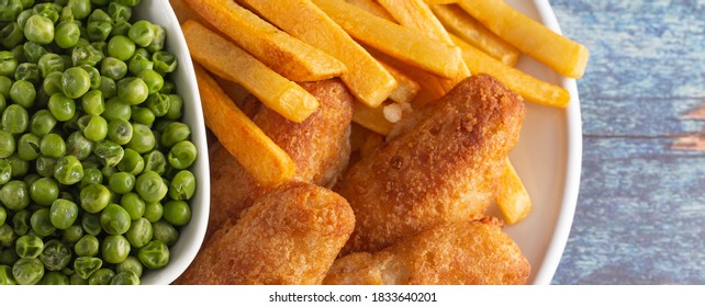 Meal Of Beer Battered Fish Chips And Peas