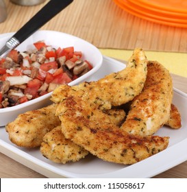 Meal Of Chicken Tenderloin Strips On A Serving Platter