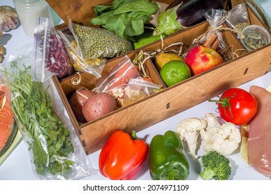 Meal Kit Delivery Concept. Set Various Healthy Dishes Food Ingredients Meat, Vegetables, Fruit, Spices With Recipes For Cooking. Online Ordering Chef Foods Ingredients, Grocery Delivery