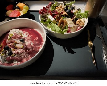 Meal on the tray in Business Class - Powered by Shutterstock