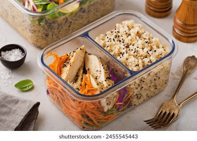 Meal Prep: A balanced meal with brown rice, grilled chicken, shredded carrots, and mixed seeds. - Powered by Shutterstock