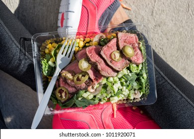 Meal Prep Fitness Lifestyle - Woman Taking Food Selfie Top View Photo Of Her Prepared Ready To Go Lunch Box For Healthy Paleo Diet - Steak Salad Take-out Eating Girl At Gym.