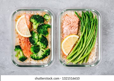 Meal Prep Lunch Box Containers With Grilled Salmon Fish, Rice, Green Broccoli And Asparagus