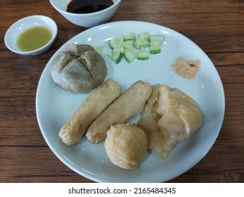 Meal Set Of Pempek. Pempek Is Traditonal Food From Palembang,indonesia. Made From Fish Processed With Flour, Served With A Distinctive Vinegar Sauce On Bowl And Chili Sauce On Saucer Dish