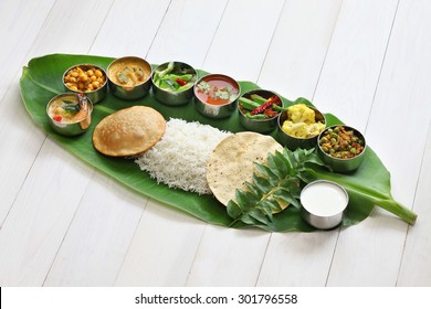 meals served on banana leaf, traditional south indian cuisine - Shutterstock ID 301796558