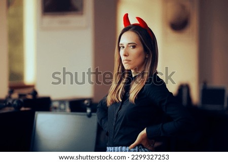 
Mean Boss Wearing Devil Horns in the Office with Condescending Attitude. Toxic manager being condescending and oppressive
