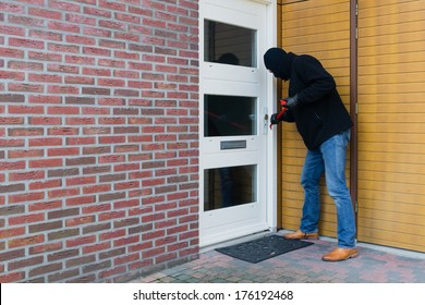 Mean Looking Burglar Enters A House