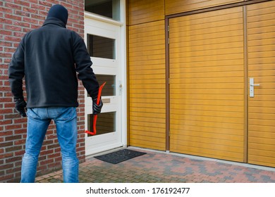 Mean Looking Burglar Enters A House