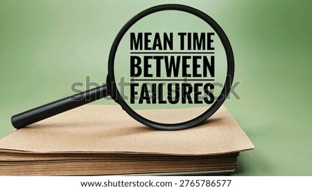 Mean Time Between Failures MTBF Text Highlighted Through Magnifying Glass on Paper Documents Representing Reliability Maintenance and Engineering Analysis. 