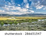 meanders of North Platte River above Northgate Canyon, North Park, Colorado - early summer scenery with partially cloudy sky