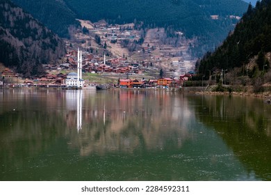 Uzungöl (meaning "Long Lake"), is a lake situated to the south of the city of Trabzon, in the Çaykara district of Trabzon Province, Turkey. Uzungöl is also the name of the village on the lake's coast. - Powered by Shutterstock