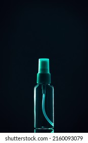 Means for face and body care. A complex of organic care products. Bottles for the transportation of cosmetics traveling by plane. Dark green color scheme. - Shutterstock ID 2160093079