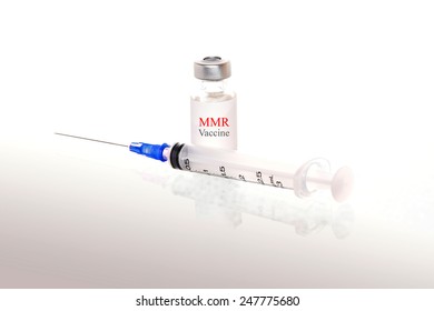 Measles, Mumps, (MMR) Vaccine With Needle (concept For Health Officials Campaign Of Protects Against Measles, Mumps And Rubella.)