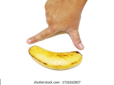 Measure banana using hand isolated white background                               