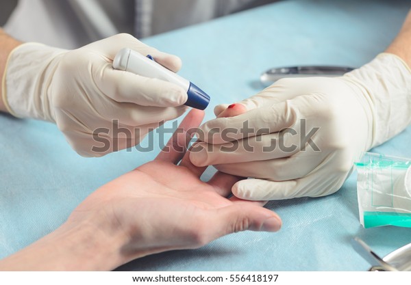 Measurement Capillary Blood Glucose Using Portable Stock Photo Edit Now 556418197