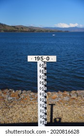 The Measurements For Water Tide At A River, Steel Ruler Water Level Meter For Water Depth Measuring Of Well Dam Lake Irrigation And Hydropower Station.