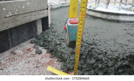 Measuring of blinding concrete height.Quantity taking from construction site. - Shutterstock ID 1732004665