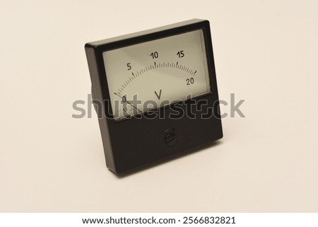 Measuring device. An old voltmeter. Arrow voltage meter.