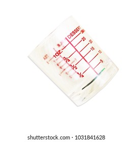 Measuring Medicine Cup On White Background