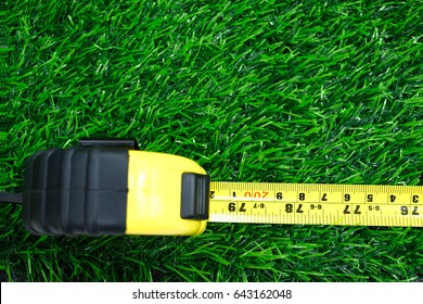 Measuring Tape On Grass