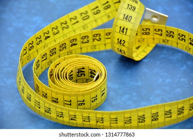 Measuring Tape Unrolled In Different Ways