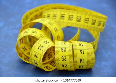 Measuring Tape Unrolled In Different Ways