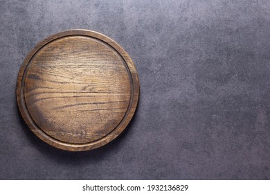 Meat Or Bread Cutting Board For Homemade Baking On Table. Food Recipe Concept At Stone Background Texture With Copy Space. Flat Lay Top View