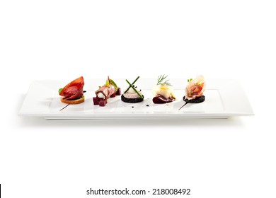 Meat Canapes on White Dish - Shutterstock ID 218008492