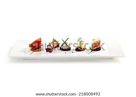 Meat Canapes on White Dish