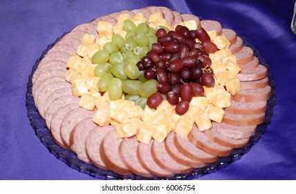 A Meat, Cheese And Fruit Tray.