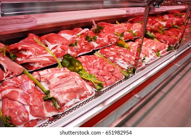 Meat Department Shelves With Typical Italian Raw Meat Inside A New Grocery Market In Rome, Italy.