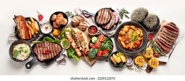 Meat dishes. Plates of various meat. Non vegetarian food banner. Top view. Panorama, banner - Shutterstock ID 2229112073