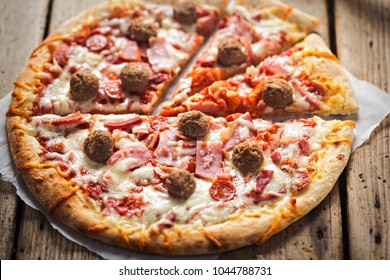 Meat Feast Pizza With Ham, Bacon, Beef