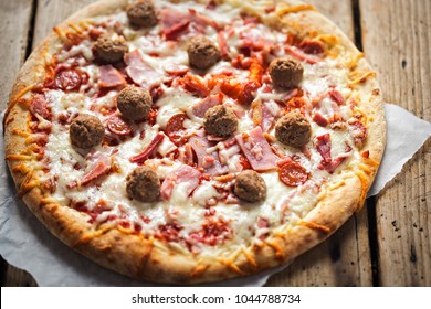 Meat Feast Pizza With Ham, Bacon, Beef