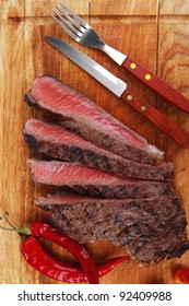 meat food : roast beef steak on wood plate isolate on white background