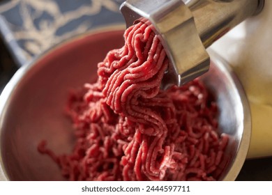 meat and grinder close up. minced meat production - Powered by Shutterstock