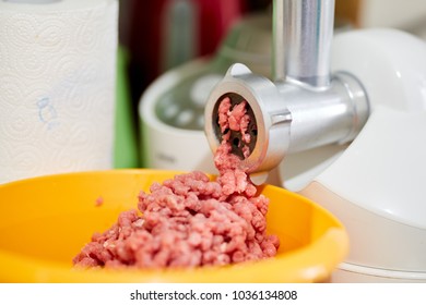 Meat grinder kitchen appliance, closeup with selective focus