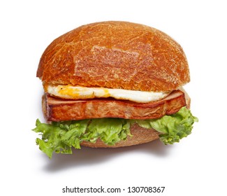 Meat Loaf On A Roll With Fried Egg Isolated On White Background