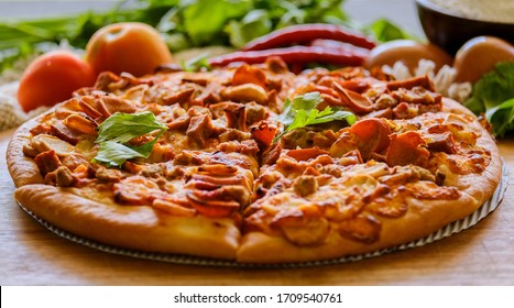 The meat lover pizza is served at Pizza restaurant.