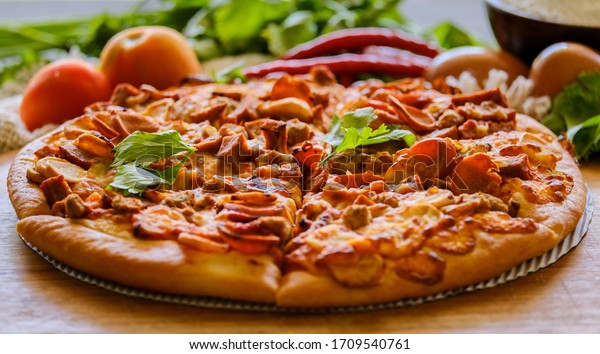The meat\
lover pizza is served at Pizza\
restaurant.