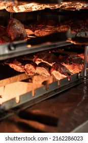 Meat On Skewers On The Grill With Fire And Embers - Brazilian Bbq Restaurant - Picanha