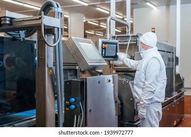 Meat Processing Plant. Production Line Of Meat.Line For The Production Of Meat With Packaging And Cutting . Industrial Equipment At A Meat Factory.