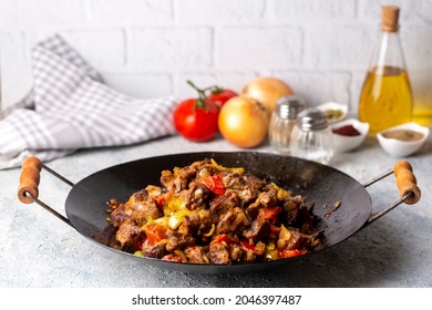 Meat saute in traditional pan - Sac kavurma, Turkish Food - Shutterstock ID 2046397487