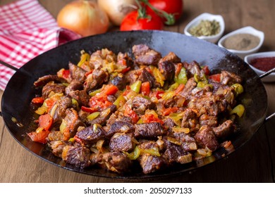 Meat saute in traditional pan - Sac kavurma, Turkish Food - Shutterstock ID 2050297133
