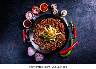 Meat Saute Turkish Et sote with wooden table - Hair Pie Meat - Sac Tava - Sac Kavurma - Shutterstock ID 2052654884