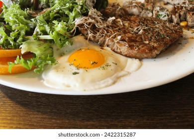 
meat steak egg soft-boiled salad food