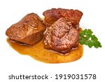 Meat stew, goulash with sauce, isolated on white background.